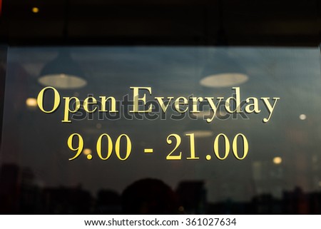 Golden sign says Open Everyday from 9.00 to 21.00