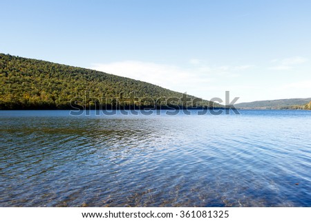 Color DSLR image of Canadice Lake, one of the New York Finger Lakes; horizontal with copy space for text