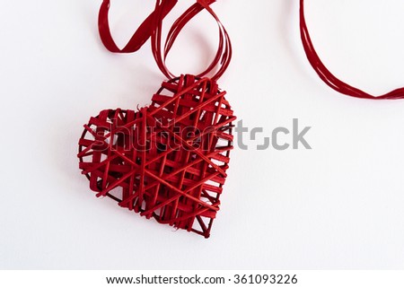 stylish red heart with ribbons, isolated on white background, valentines greeting card concept