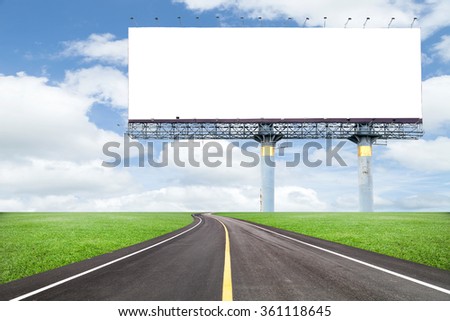 Blank billboard for your advertisement  with space for text on road curve,with green grass and blue sky white cloud 