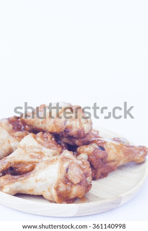 Grilled chicken wings isolated on white background, stock photo