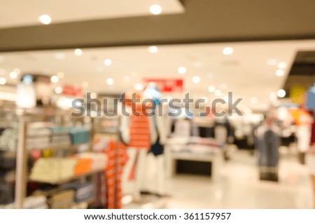 Abstract blurred of lady fashion display in shopping center, colorful blurred background.