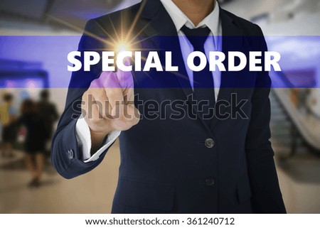 Businessman touching SPECIAL ORDER sign on virtual screen ,business concept ,business idea