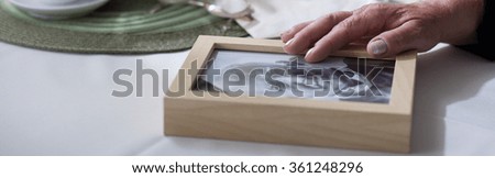 Panorama of bereaved woman yeraning for dead husband Royalty-Free Stock Photo #361248296