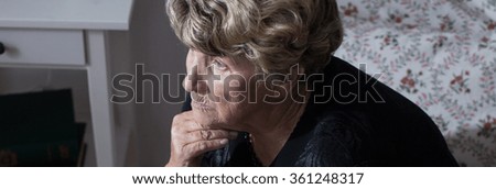 Panorama of bereaved miserable woman reminiscing late husband Royalty-Free Stock Photo #361248317
