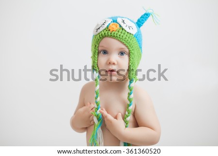 Little baby in a funny hat 