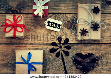 Gift boxes, heart shape and word Love