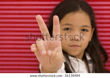 Asian Girl Making Peace Sign