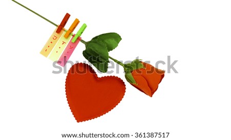 Red love and rose with sticky note clipped using clothes clip with JUST FOR YOU - greeting card concept