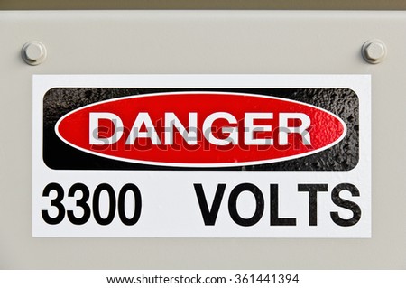 High voltage (3300 volts) danger sign on electrical equipment