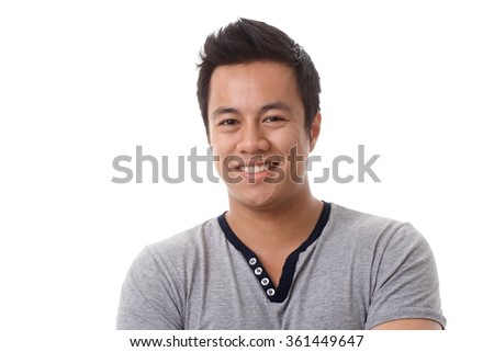 Closeup portrait of happy young Asian man smiing, looking at camera. Royalty-Free Stock Photo #361449647