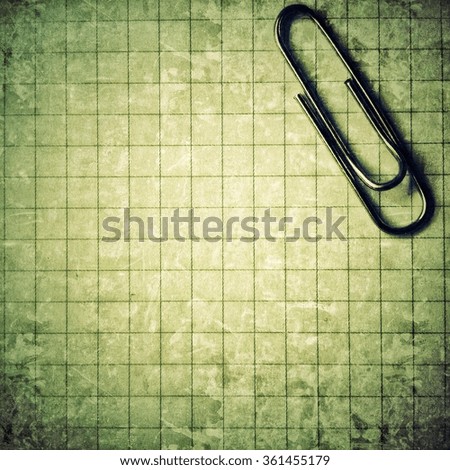 Paperclip and paper. Office tools
