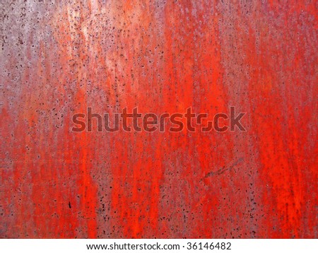 Texture of an old rusty metal surface with cracked paint