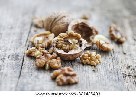 Walnuts on wooden table 