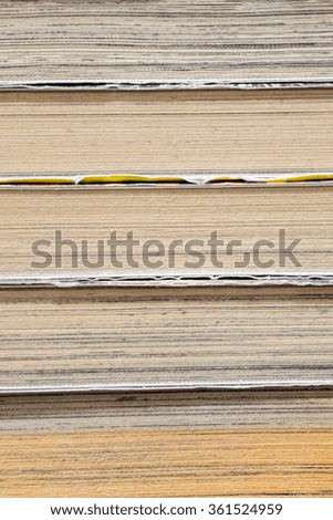 Closed up stacking cartoon books texture as background