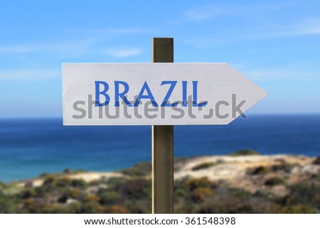Brazil sign with seashore in the background