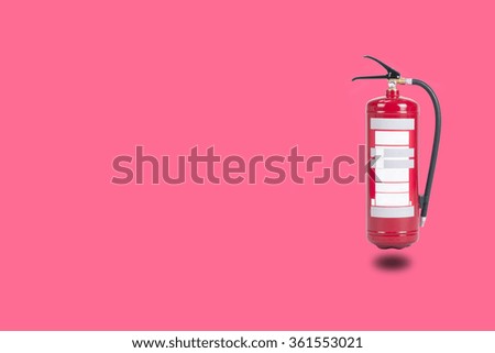 Fire extinguisher on a magenta  background