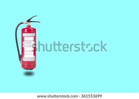 Fire extinguisher on a turquoise  background