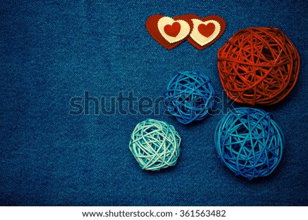 Romantic composition and space for text. Romantic love theme on jeans background. Toned.