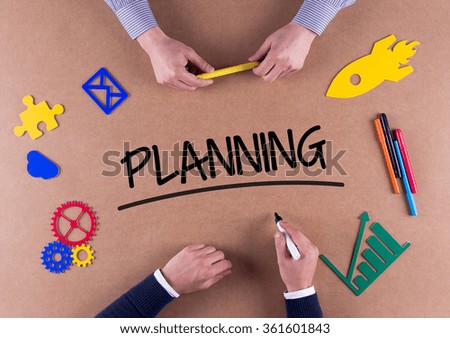 Business Team with a single word PLANNING