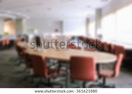 blur image of Reading Desk and a books on the library 