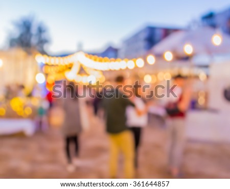 blur image of night festival on street blurred background with bokeh .