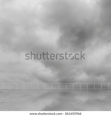 Background of clouds and reflection on the ground of a roof of building with nobody.