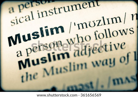 Close up of English dictionary page with word muslim