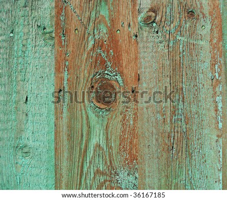 Wooden fence with paint traces