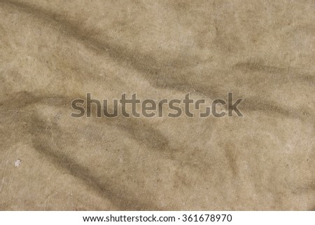 Old Faded Military Army Camouflage Backpack Or Bag Or Uniform Horizontal Background Texture Close-up Top View