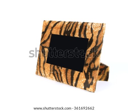 Wildlife fur tiger photo frame isolated on white