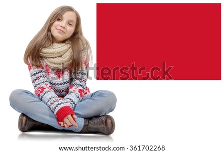 a closeup image of a pretty little girl sitting on the floor.