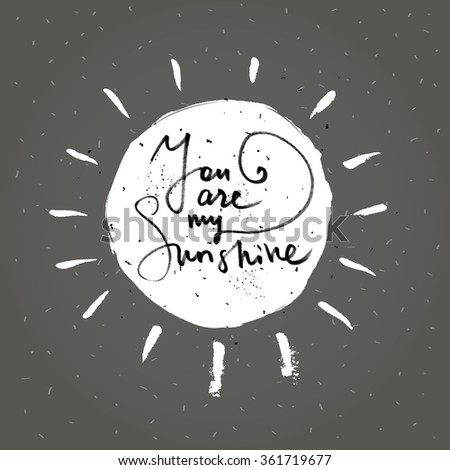 You are my sunshine, hand drawn text in silhouette of sun. Romantic quote for save the date or valentines day card. Lettering calligraphic illustration.