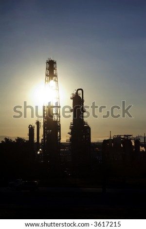 refinerie in strong back light - portrait format