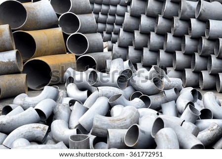 Pipes and bends steel in the factory warehouse
