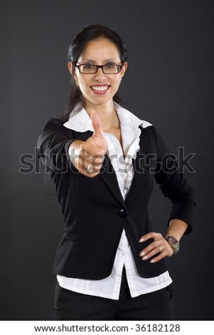 picture of an attractive businesswoman making her ok sign