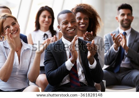 Audience Applauding Speaker At Business Conference Royalty-Free Stock Photo #361828148