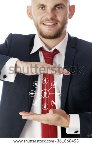close-up portrait of a handsome young man in a suit gestures on a white background studio