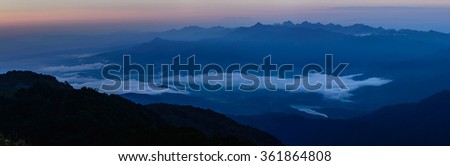 Panoramic view of skyline with mist and mountain at Doi Pha Hom Pok, the second highest mountain in Thailand, Chiang Mai, Thailand.
