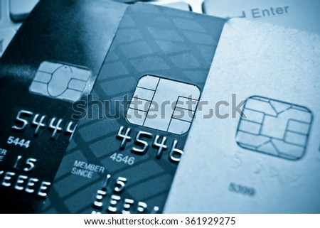Credit card on computer keyboard / e-commerce concept