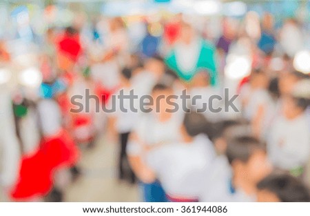 Abstract blur image of people at school activity for background usage .
