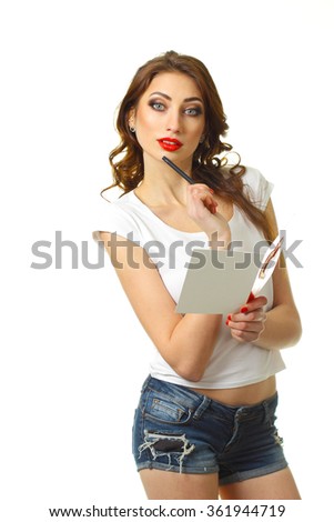 Attractive young woman with card on Valentine Day. Young romantic girl with Valentines card. Attractive hipster girl with love letter