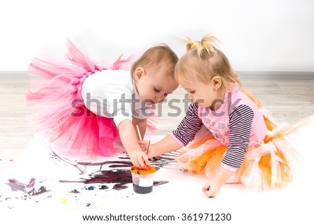 Children, little girls paint colors