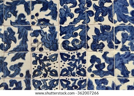 White and blue tiles on house facade - azulejos