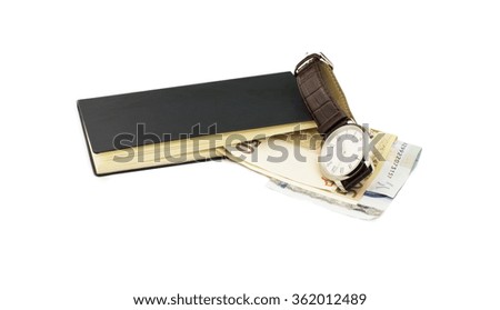 The euro, notebook and wristwatch on a white background