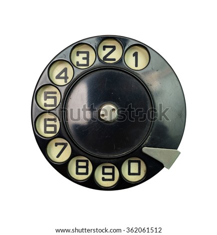 black vintage phone dial disk over white