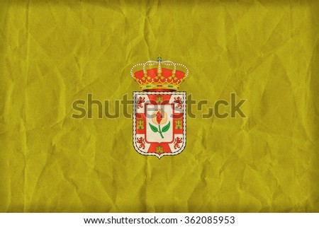 Granada flag on paper texture,retro vintage style