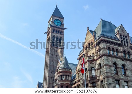 Old City Hall in Toronto during a blue sky day with a few clouds