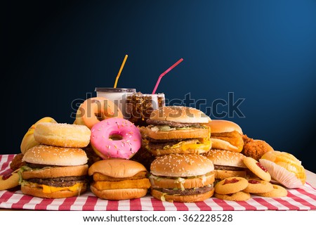 Multiple type of Fast food on table. Royalty-Free Stock Photo #362228528