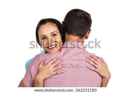 Calm couple hugging on white background